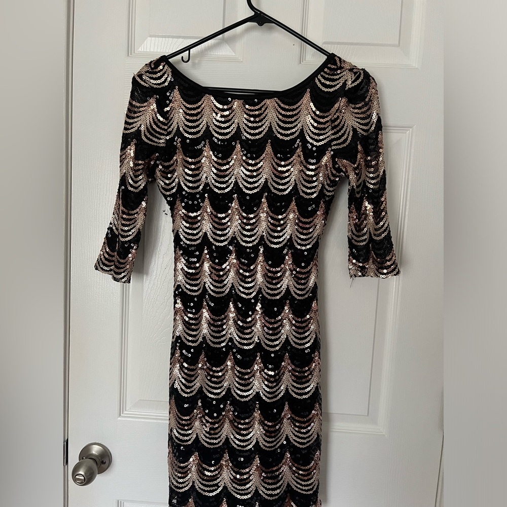 Sequin material midi dress.